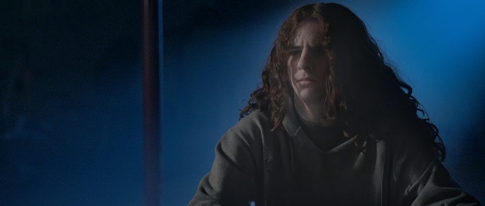 Samuel, played by Deacon Grasty, in shadow.